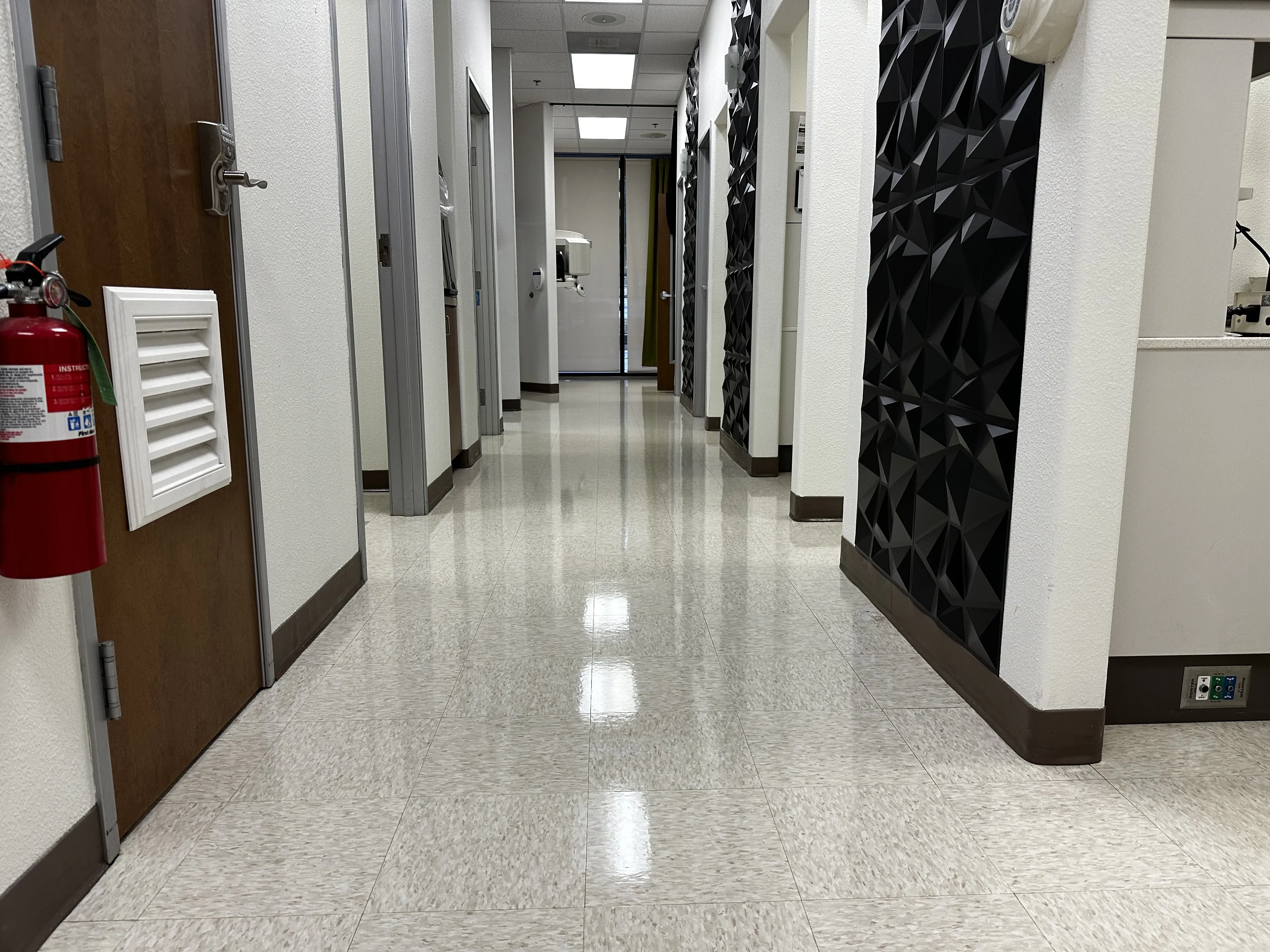 Dental office reception area with freshly waxed VCT tile