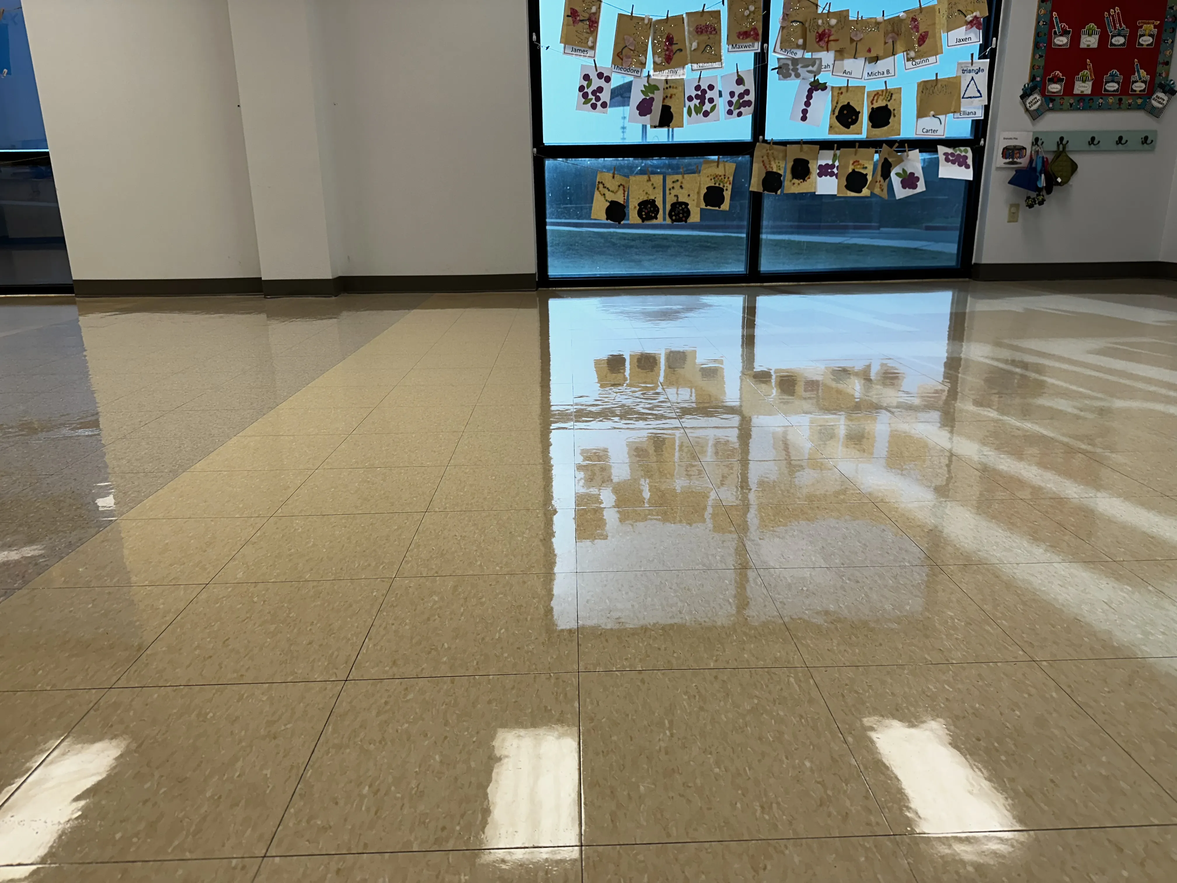 School corridor with a high-gloss wax finish on VCT tile