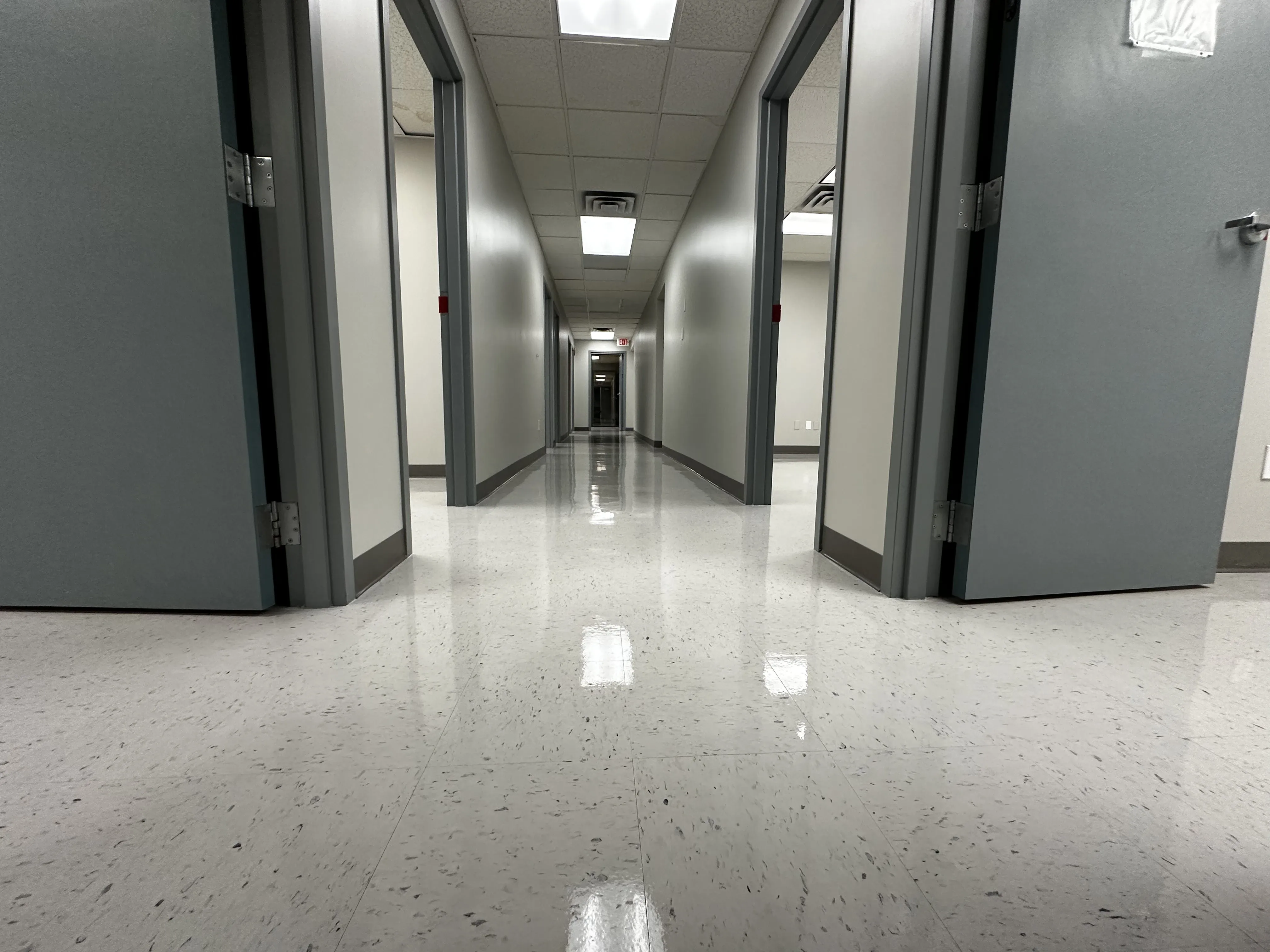 Hospital wing VCT flooring with a freshly applied protective wax coat