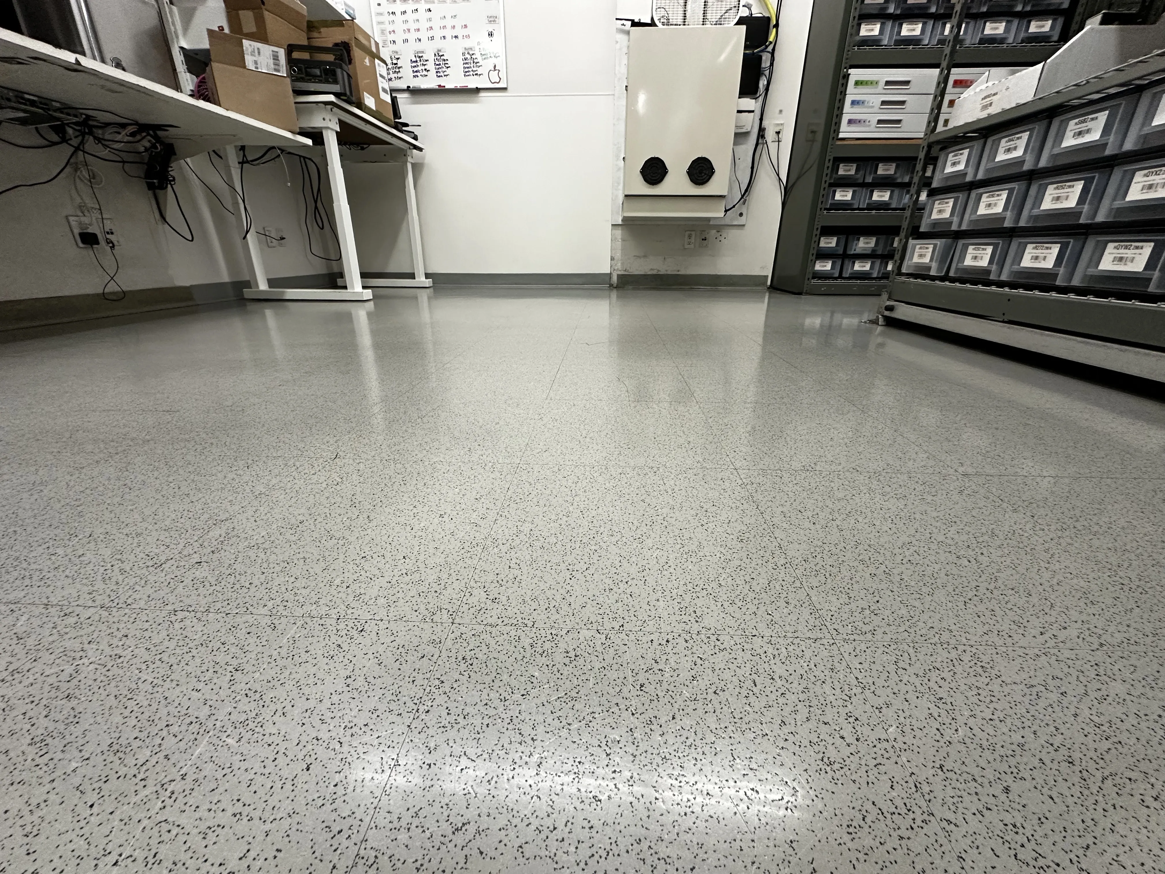 Apple retail VCT floor showing the consistent surface quality of a fresh recoat