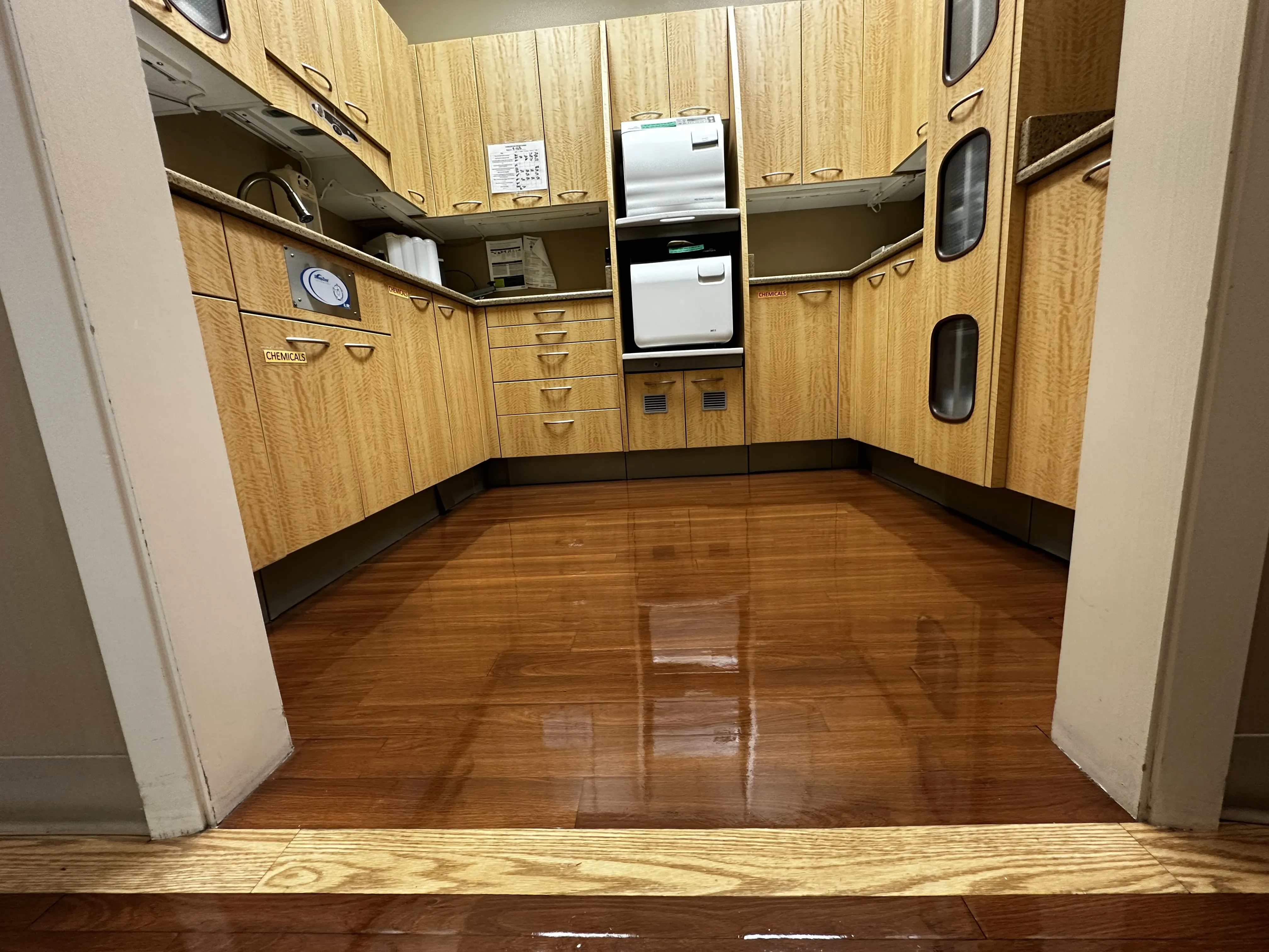 Dental office vinyl floor restored to a glossy, hygienic finish
